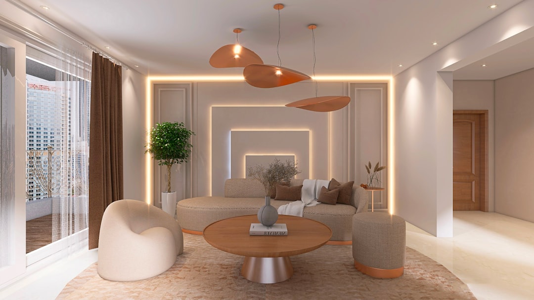 A professionally staged, bright, and airy living room with minimalist modern furniture, showcasing a home's maximum value to potential buyers.